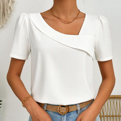 Mildred | Dames blouse met asymmetrische halslijn en pofmouwen
