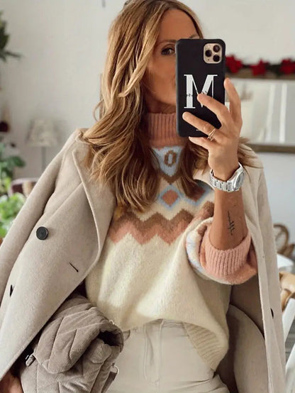 Violette sweater met veelkleurig patroon – een chique en comfortabele must-have voor elke garderobe. Met een relaxte pasvorm en warme pastel- en neutrale tinten biedt deze trui stijl en comfort voor casual bijeenkomsten, brunches of gezellige avonden thuis. Combineer eenvoudig met jeans of leggings voor een moeiteloze look. Verkrijgbaar in veelkleurig, maten S-XL. Voeg moderne elegantie en cozy vibes toe aan je outfits met de Violette. Bestel nu!