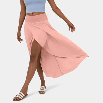 Libra | Elegante Gespleten Maxi Rok - Voeg stijl en comfort toe aan je garderobe met de Libra maxi rok. Ideaal voor elk seizoen dankzij het high-low ontwerp, ruches voor extra volume, en een elegante maxi-lengte. Perfect voor kantoor, avondjes uit of casual dagen. Gemaakt van duurzaam polyester in diverse kleuren: Khaki, Oranje, Roze, Blauw, Vermiljoen en Wijn. Verkrijgbaar in maten XS-XL. Upgrade je looks met deze tijdloze must-have!