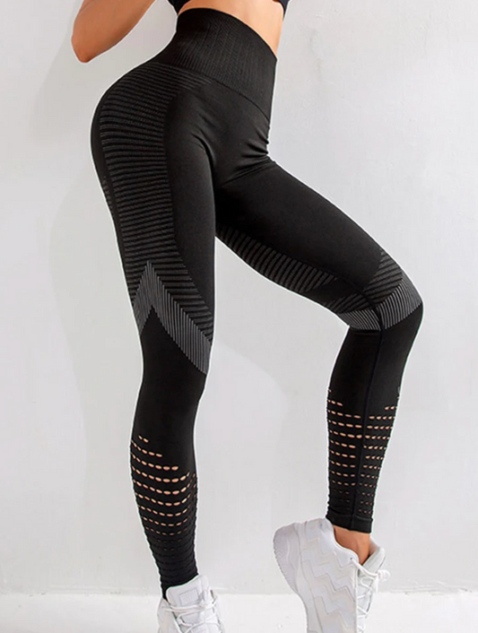 Doutsen sportlegging met hoge taille voor optimale ondersteuning en een flatterend silhouet. Gemaakt van een ademende en flexibele mix van polyester, nylon en spandex voor maximaal comfort tijdens workouts. Naadloze constructie voorkomt irritatie en het push-up effect accentueert je natuurlijke vormen. Perfect voor hardlopen, yoga, gym en athleisure. Verkrijgbaar in zwart, maten XS-2XL. Bestel nu en ervaar de perfecte combinatie van stijl, support en bewegingsvrijheid!