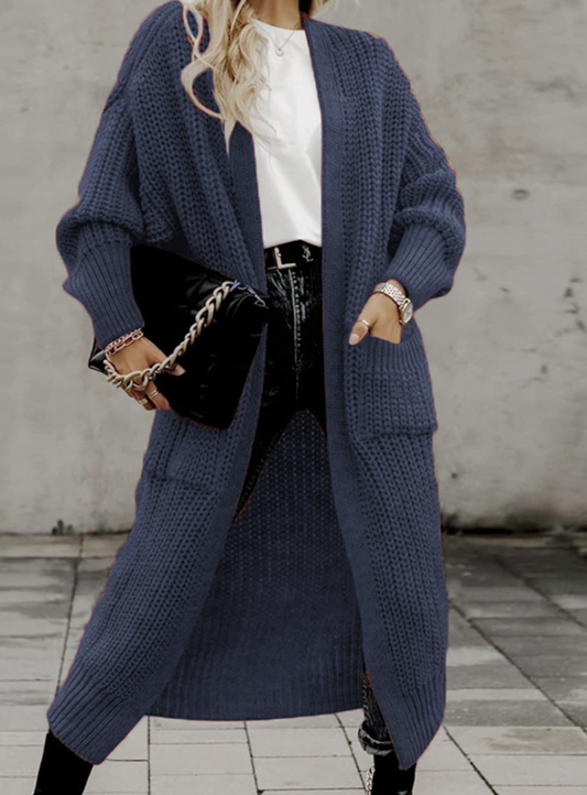 Vivienne | Voeg moeiteloze stijl en warmte toe aan je garderobe met de Vivienne. Deze oversized jas heeft een tijdloos silhouet, grote functionele zakken en is gemaakt van zachte, knusse stof. Verkrijgbaar in marineblauw, donkergrijs, kameel, lichtgrijs en zwart, en maten S-4XL. Perfect voor frisse dagen en stijlvolle casual looks. Combineer comfort en veelzijdigheid met de Vivienne. Bestel nu en geniet van tijdloze elegantie en ultiem draagcomfort!