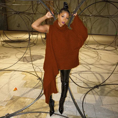 Ervaar verfijning met de Malina, een asymmetrische top die comfort en stijl biedt voor koude dagen. Ideaal voor casual uitjes, frisse avonden of als laagje over je favoriete outfits. Verkrijgbaar in Geel en Baksteen Rood, maten S-4XL. Combineer warmte en veelzijdigheid in één elegant kledingstuk. Bestel de Malina vandaag en voeg een unieke flair toe aan je garderobe!